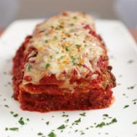 Lasagna Classico · Crumbled meatballs and sausage, ricotta, meat sauce.