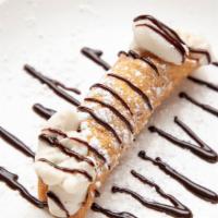 Cannoli · Homemade filling, topped with chocolate chips.