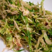 Shaved Brussels Sprout Salad · Fine shaved brussels sprouts with bacon and brown sugar