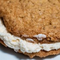 Oatmeal Moon Pie · 2 homemade oatmeal cookies sandwiched around our own creamy whipped center