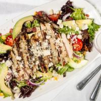 Cobb Salad · Bacon, smoked chicken, corn, red onion, avocado, egg, tomato and bleu cheese with choice of ...