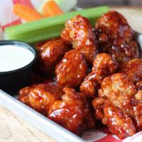Boneless Wings · Half pound of boneless wings tossed in your choice: dry rub, hot, mild, BBQ, sweet ginger te...