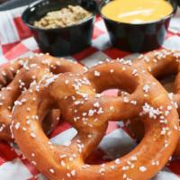 Soft Pretzels · Trio of pretzels served with house cheese and mustard.