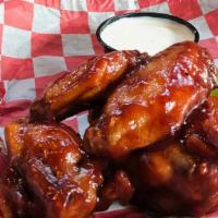 Wings 1/2 Pound · 1/2 Pound jumbo chicken wings, choice of: dry rub, hot, mild, BBQ, sweet ginger teriyaki, to...
