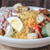 Chef Salad · Ham, turkey, egg, cheddar cheese, tomato, red onion, cucumber, croutons with choice of dress...