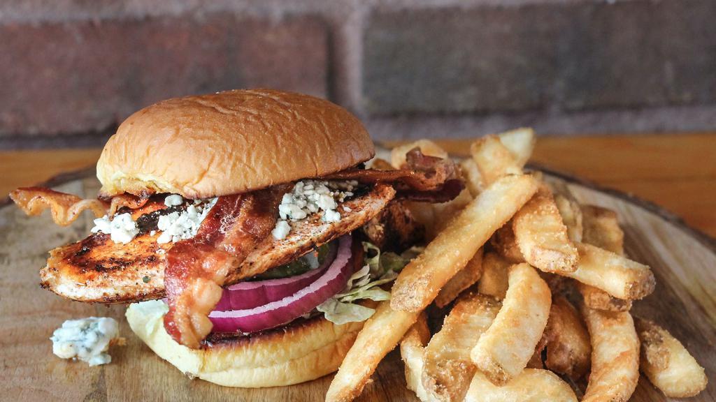 Cajun Bleu Bird · Grilled chicken dusted with cajun spices and topped with crumbled bleu cheese, lettuce, tomato, onion, pickle.