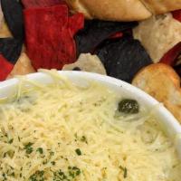 Spinach Artichoke Dip · Creamy dip made from spinach and artichoke.