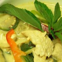 Green Curry · Hot and spicy. Thai spicy green curry with coconut milk, green pepper, and onion.
