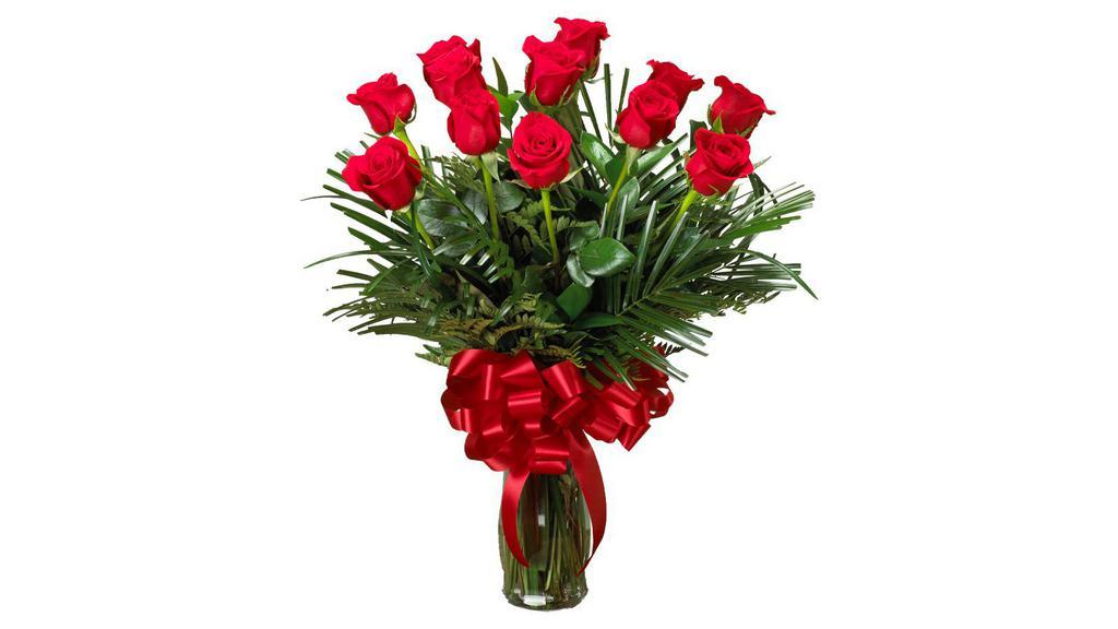 Traditional Dozen Roses · Classic red roses designed in a glass vase with greenery.