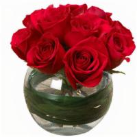 Endless Love Arrangement · One dozen red roses arranged in a  contemporary design and vase