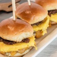 Breakfast Sliders · (3) Flavorful nitrate-free chicken sausages on brioche mini buns with savoury-sweet bacon ja...