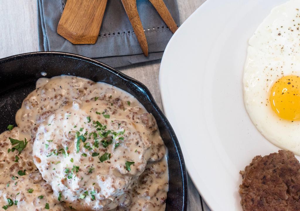Biscuits & Gravy With Sausage & Eggs
 · Two large, flaky biscuits smothered in our flavorful sausage gravy with eggs, hand pattied sausage and crispy seasoned potatoes.