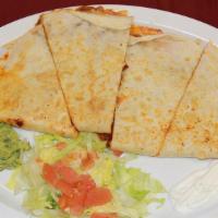Jumbo Quesadilla - Meat Or Vegetarian · Large tortilla folded with cheese and your choice of a meat or vegetarian fillings inside.