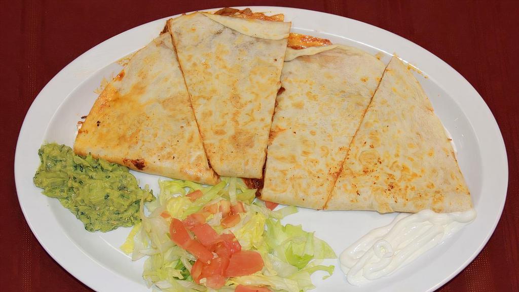 Jumbo Quesadilla - Meat Or Vegetarian · Large tortilla folded with cheese and your choice of a meat or vegetarian fillings inside.