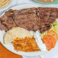 Bistek A La Tampiquena Dinner · Tender skirt steak, one cheese enchilada and one quesadilla with rice, beans, salad and tort...