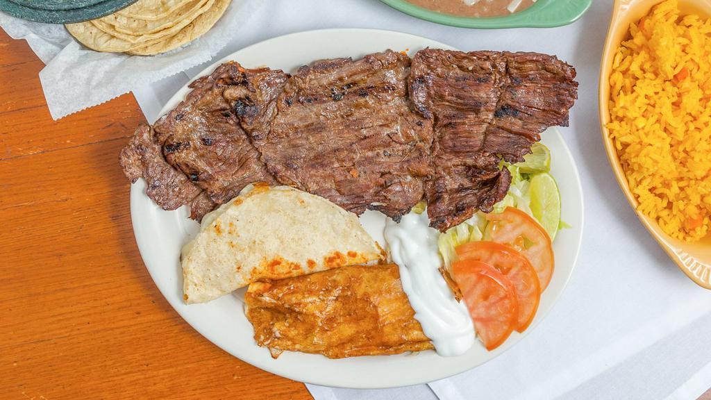 Bistek A La Tampiquena Dinner · Tender skirt steak, one cheese enchilada and one quesadilla with rice, beans, salad and tortillas - an el ranchito specialty.