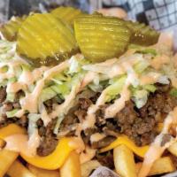 Big Poppa · Fries loaded with grilled steak & onions, yellow American cheese, shredded lettuce, pickles,...