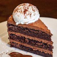 Triple Layer Chocolate Cake · Hot fudge, whipped cream