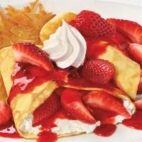 Strawberry Crêpes  · Two made-from-scratch crêpes stuffed with sweet supreme cream and fresh strawberries, topped...