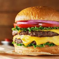 Double Cheeseburger · 2 Freshly seasoned beef patties, served on toasted brioche buns, with a double portion of ou...