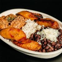 The Venezuelan Chicken · Traditional Venezuelan dish (Pabellón Criollo) with white rice, black beans, fried sweet pla...
