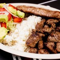 The Argentinian · Steak, grilled pork  chorizo, avocado, salad mix and white rice.