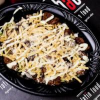Parrilla Mixta · Chopped steak, chopped special chicken, green mixed, parmesan cheese and our special BAE sau...