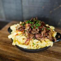 Pulled Pork Mac & Cheese Dinner · Mac n’ Cheese topped with Pulled Pork + Honey Chipotle