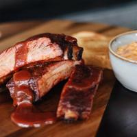 Pork Spare Ribs Dinner · Four meaty center-slab ribs. Includes one side.