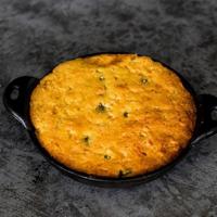 Smoked Jalapeño Cheddar Cornbread · Served with honey butter