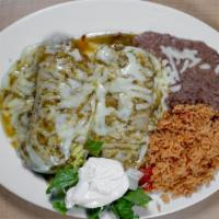 2 Shrimp Enchilada Plate · Two rolled corn tortillas filled with chipotle garlic, sautéed shrimp topped with jack chees...