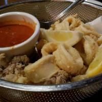 Calamari · Lightly seasoned and fried to perfection.