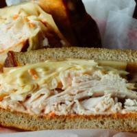 Be’S Bustling Birdwich · Oven-roasted turkey breast, swiss cheese, creamy coleslaw, Russian dressing, and grilled on ...