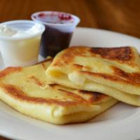 Two Homemade Cheese Blintzes · Served with Clearbrook Farms Preserves or sour cream.