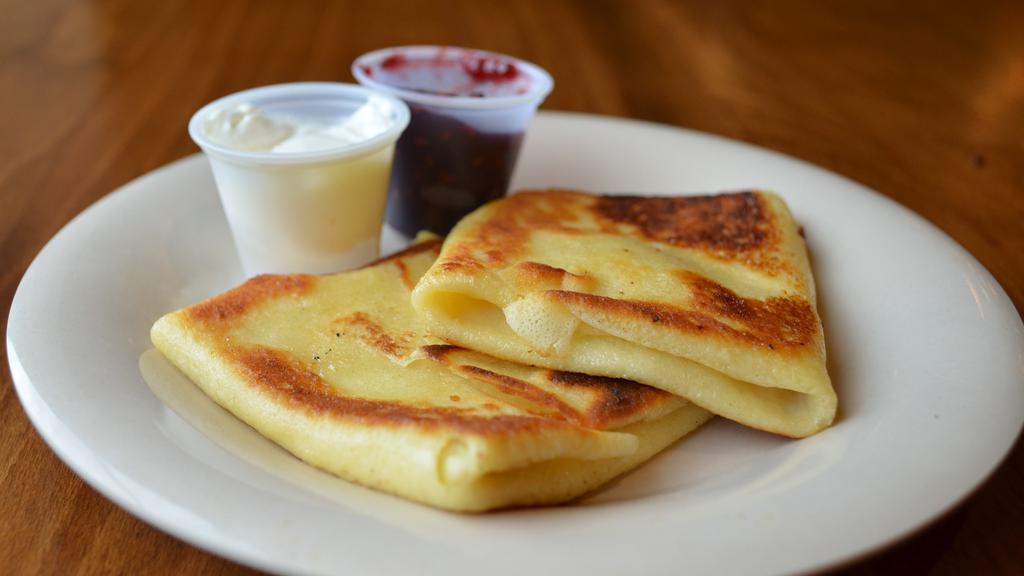 Two Homemade Cheese Blintzes · Served with Clearbrook Farms Preserves or sour cream.