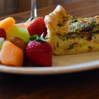 Homemade Deep-Dish Quiche · Made from scratch in our own kitchen using only the finest ingredients. Served with fresh fr...