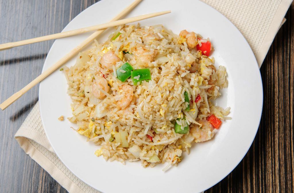 Shrimp Fried Rice · Stir fried rice with shrimp, egg,  and vegetables.