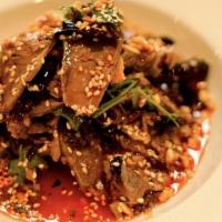 Red Oil Beef · Cooked sliced beef that has been chilled, mixed with cilantro and peanuts in a spicy tangy d...