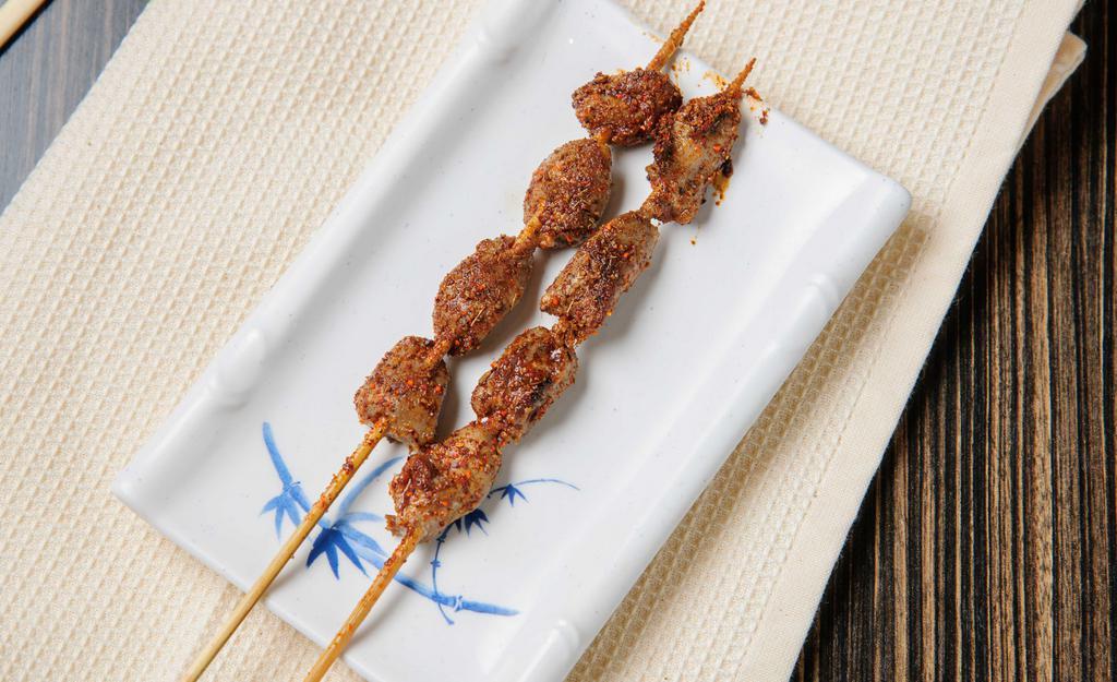 Chicken Heart · Grilled chicken hearts on a skewer sprinkled with cumin, chili, and seasonings. 2 pieces.