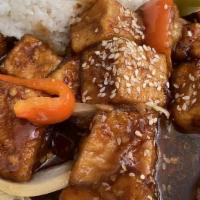 Tiger Tofu · Fried tofu, bell peppers, and onion tossed in a sweet and spicy Yuxiang sauce. Garnished wit...