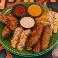 Starter Combo · fried mozzarella wedges, mac & cheese bites, fried pickles, battered chicken tenders with ra...