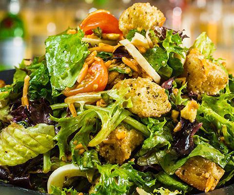 Melt House Salad · Mixed greens, cherry tomato, hard boiled egg, herb croutons, crumbled feta or blue cheese or shredded cheddar, choose a house made dressing. (V) (VG)