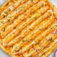 Buffalo Buffet Pizza · Chicken marinated in spicy sauce topped with mozzarella cheese and creamy ranch sauce baked ...
