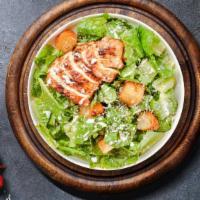 Cheeky Caesar Salad · Romaine lettuce, grilled chicken, house croutons, and parmesan cheese tossed with Caesar dre...