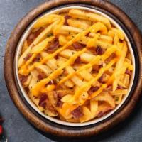 Bacon Lovin' Cheese Fries · Idaho potato fries cooked until golden brown and garnished with salt, melted cheddar cheese,...
