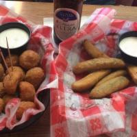 Popper Bites · Peppers and creamy blended cheeses. Served with ranch dressing.