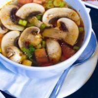 Tom Yum Soup · Vegan. Mushrooms, green onions, tomatoes, lemongrass. Sweet and tangy with a touch of spice....