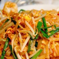 Pad Thai Lunch · Traditional sauteed rice noodles with beansprouts, green onion, egg and topped with crushed ...