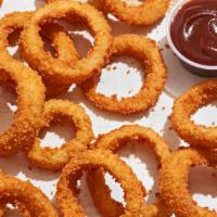 Crunchy Onion Rings · Served with Honey BBQ Sauce.