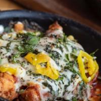 Philly Balls · Chicken chunks covered in sautéed onions, green peppers, mushrooms, and topped with mozzarel...